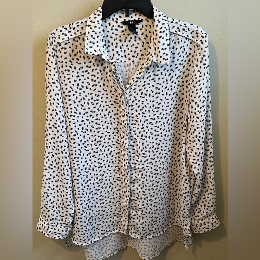 H&M white with black/gray star long sleeve button down blouse.